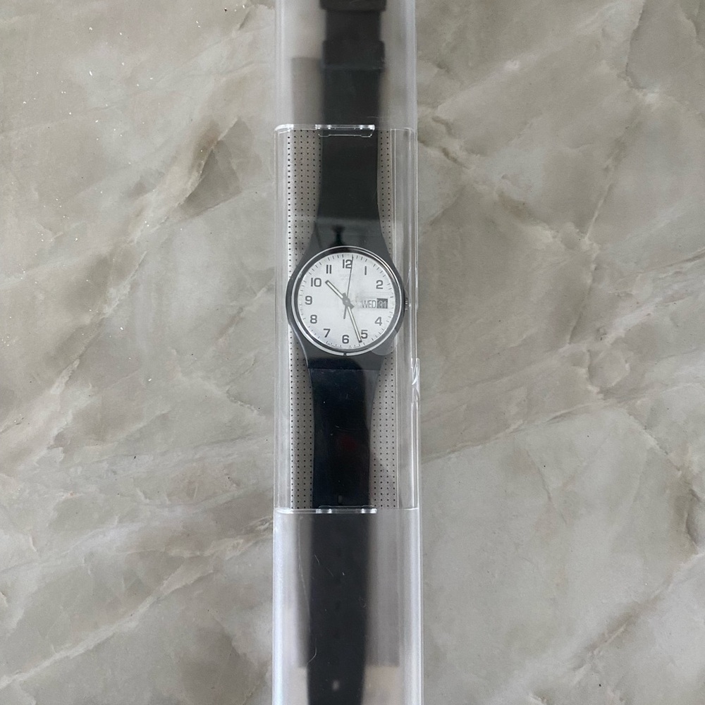 Vintage 1999 Swatch Watch with original case and paperwork. Never worn.